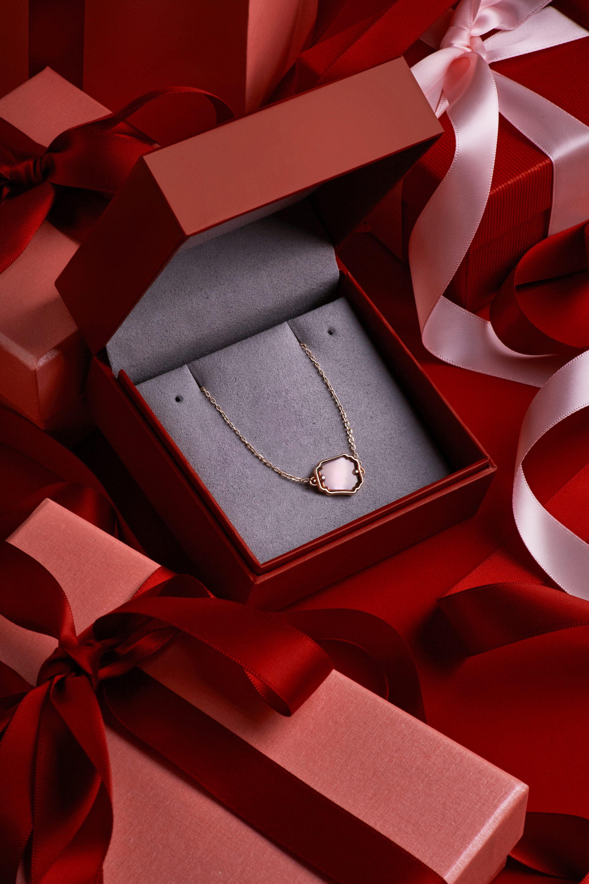 IS_AM necklace in box